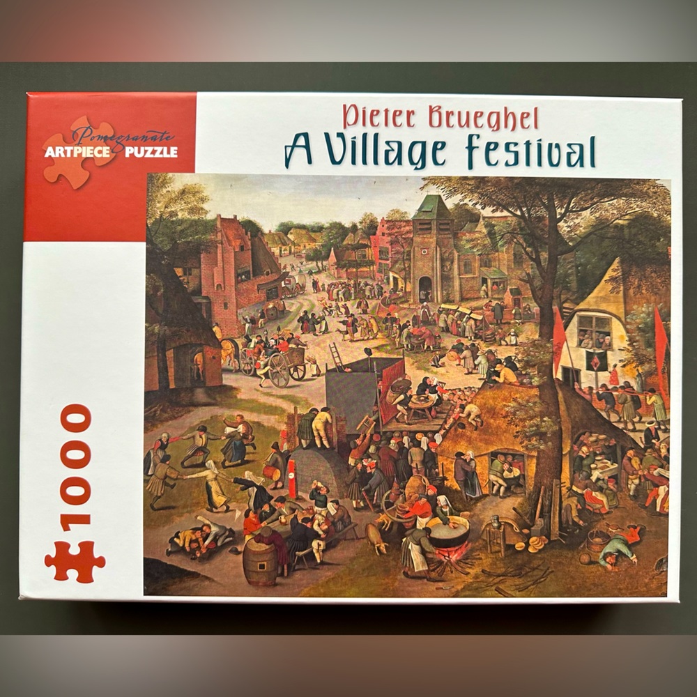 1000 piece puzzle “A Village Festival” by Pomegranate